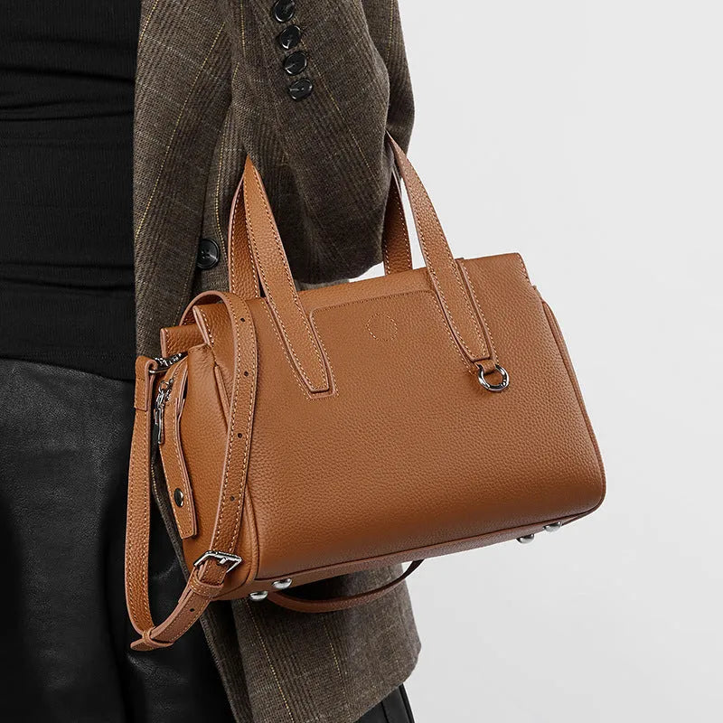 Genuine leather crossbody bag with square shape and adjustable shoulder strap