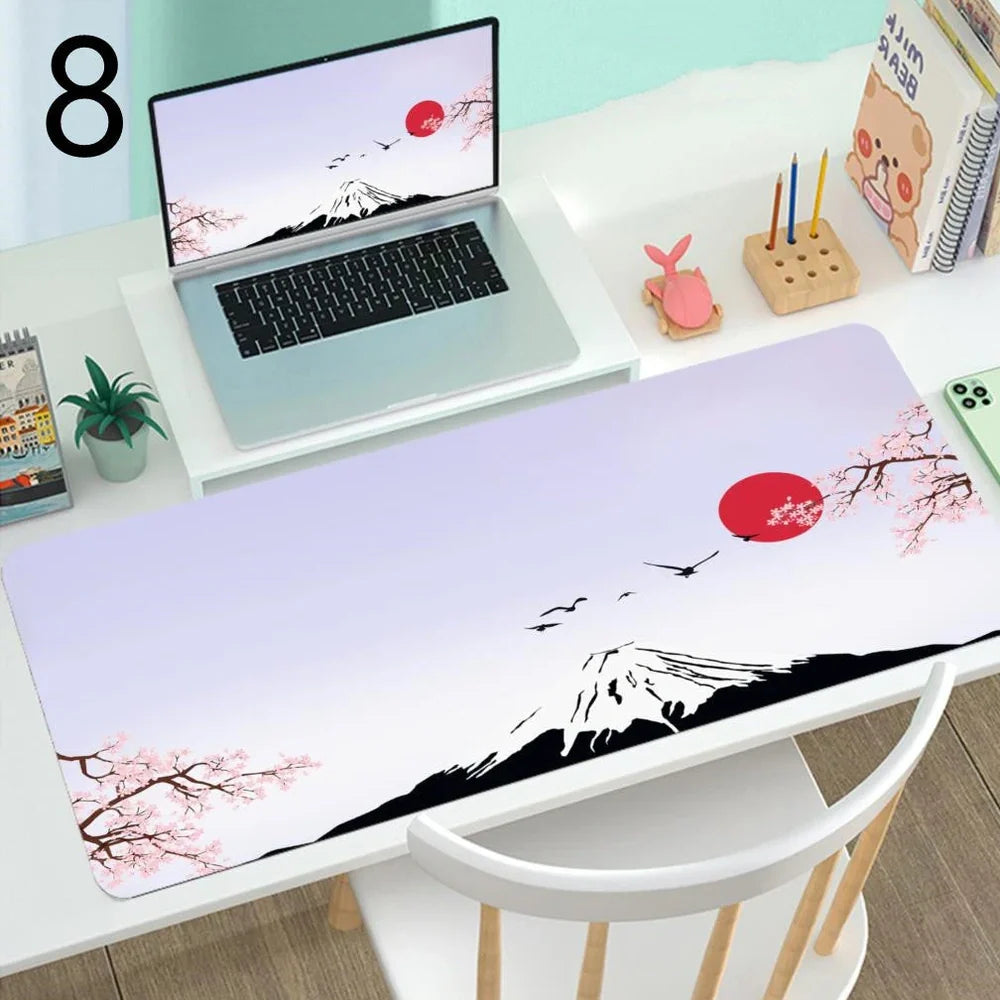 Large gaming mouse desk mat showing printed design on rubber surface with size options up to 400x900mm