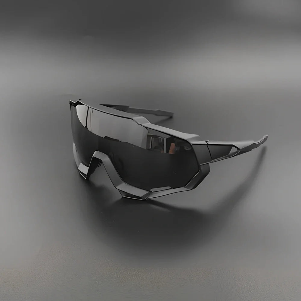 Cycling glasses with interchangeable lenses showing UV400 protection and lightweight frame design