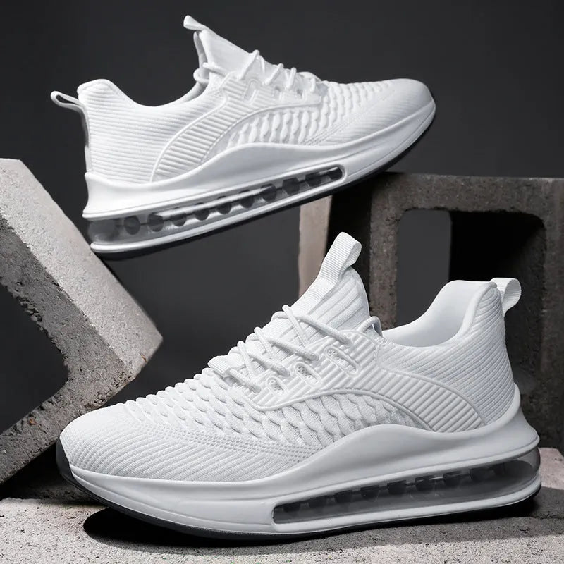Men's black low-top mesh running shoes with lace-up front and platform sole.
