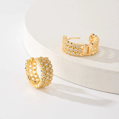 Women's copper all-matching earrings in HYL407010 color, showcasing exquisite design and durable construction