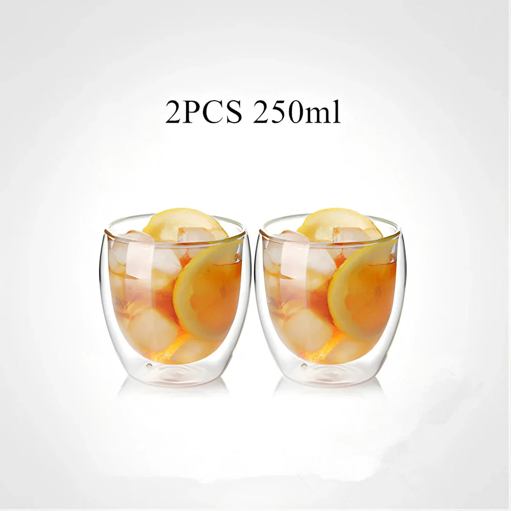Clear double-layer glass coffee cup with Chinese-style design showing insulating air gap between walls