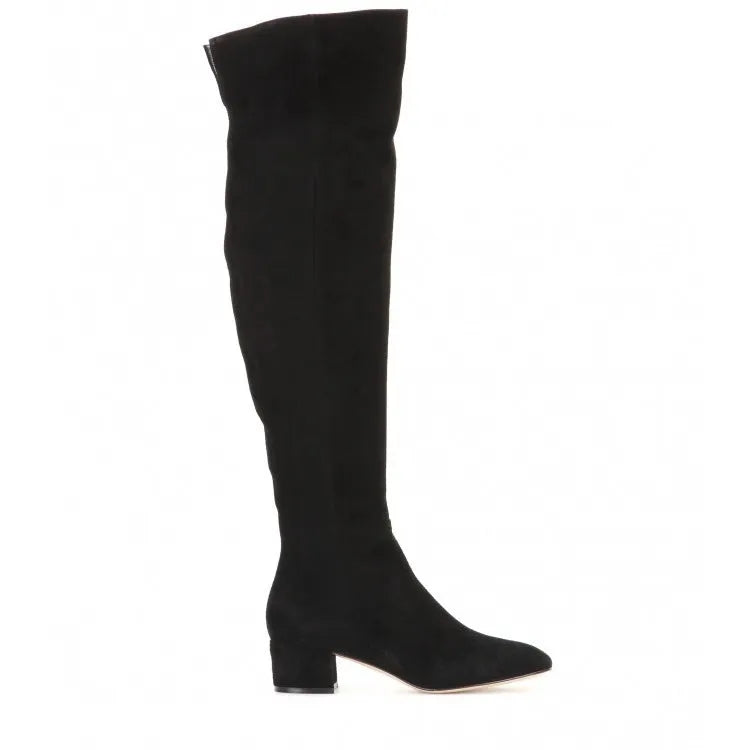 Women's grey suede over-the-knee flat boots with pointed toe and thick rubber sole on a neutral background