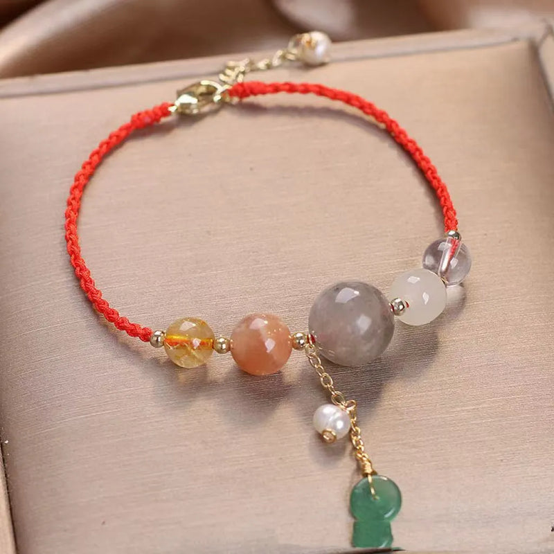 Hand-woven Peace Buckle Bracelet Wrist String for Women available in red, green and blue crystal colours featuring sequin embellishments with adjustable buckle fastening