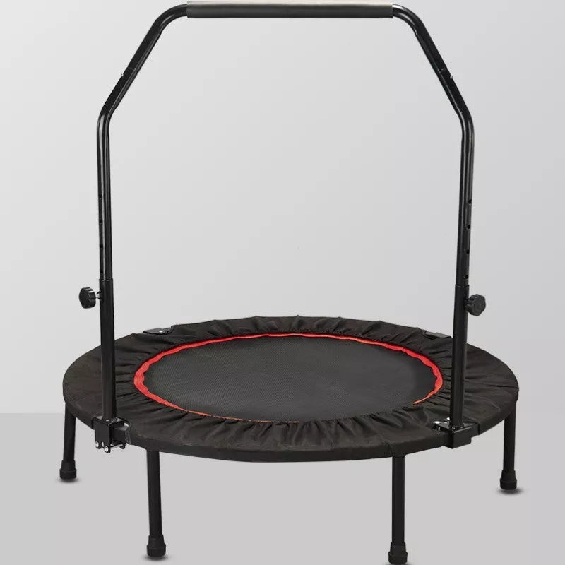 Red and black indoor trampoline with optional safety handrail for kids and adults
