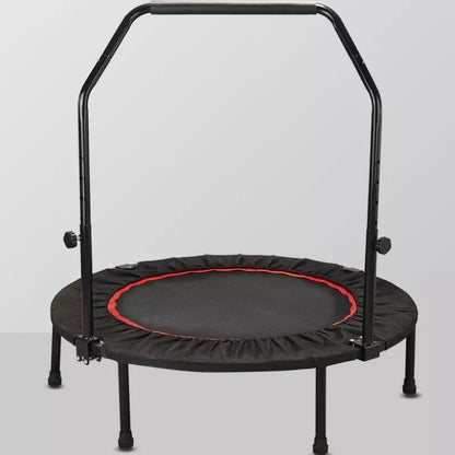 Red and black indoor trampoline with optional safety handrail for kids and adults