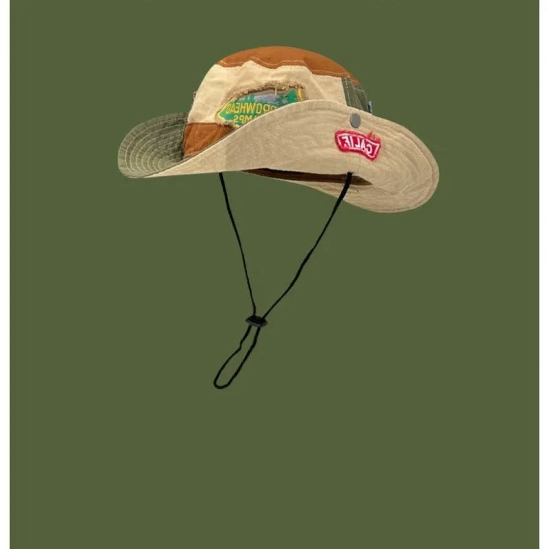 Army green cotton foldable fisherman hat with flat top crown and hand-painted patchwork design