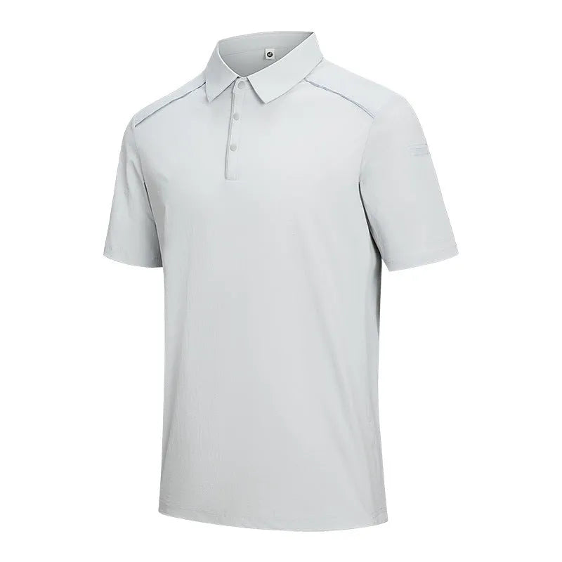 Man wearing a solid colour quick-dry polo shirt with short sleeves and a side slit detail.