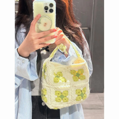Handmade cotton crochet handbag with cherry blossom pattern and magnetic buckle closure