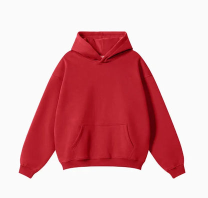 Men's grey terry hooded sweater with drop-shoulder sleeves and front pocket, showing textured cotton fabric