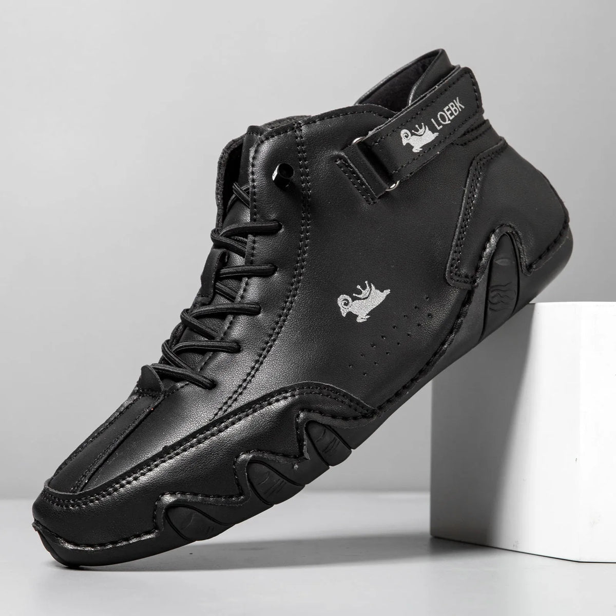 Men's brown microfiber Martin boots with flat heel, round toe, and rubber sole.