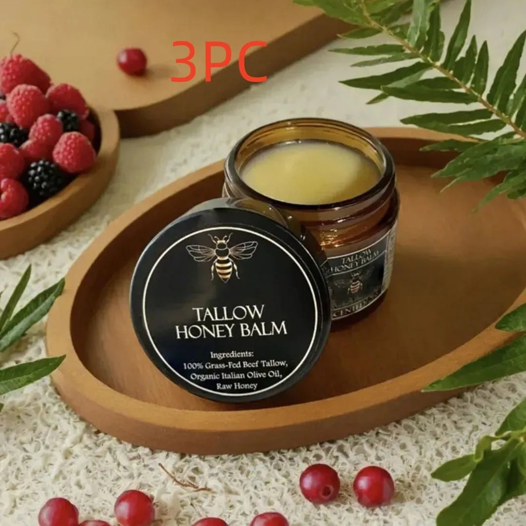 Glass jar of Honey Butter Moisturising Facial Cream with 57g net content label, shown with a dab of cream.