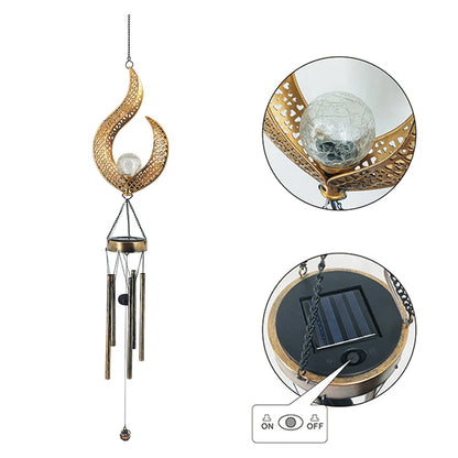 Solar wrought iron wind chime lamp with hollow flame design for garden lighting