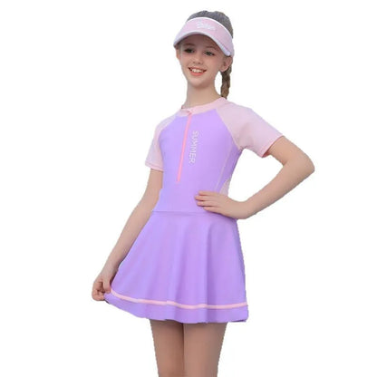 Children's conservative swimsuit dress in pink purple or blue, sizes 3XL-7XL, nylon with polyester lining.