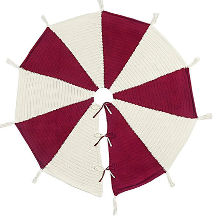 Red and white knitted Christmas tree skirt measuring 122cm square with tassel decoration