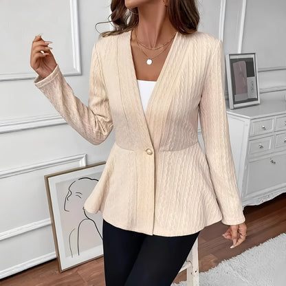 Women's apricot coloured knitted cardigan with jacquard pattern and one button front closure.