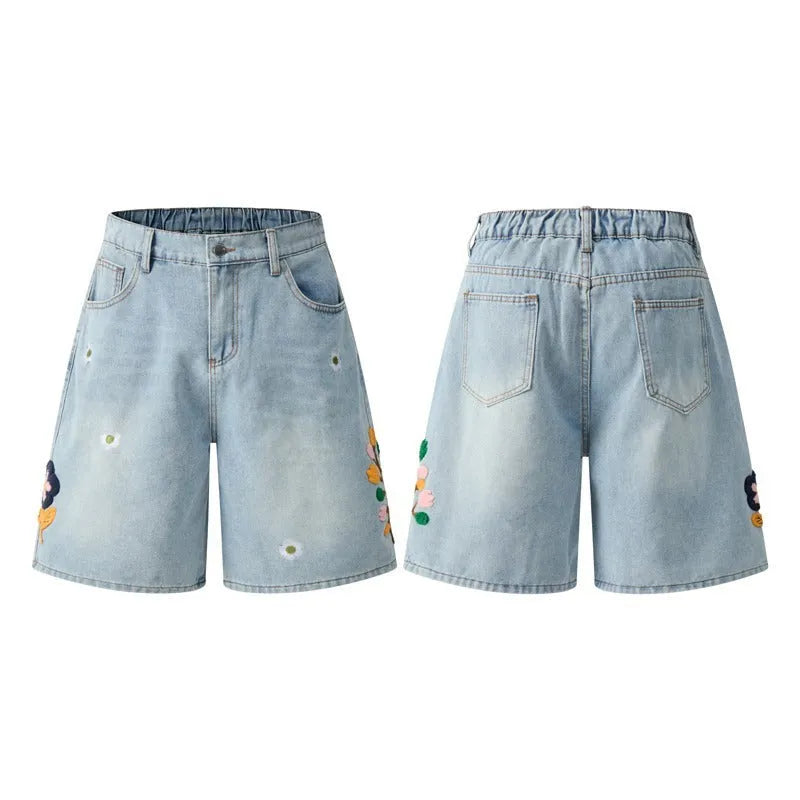 Retro loose-fit washed cotton workwear shorts in camouflage green colour with zip fly.