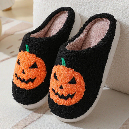 Pumpkin-shaped slippers in white and black colors, featuring a cozy cotton lining and non-slip rubber sole for comfortable indoor wear.