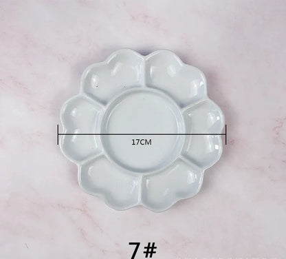 White handmade ceramic plum blossom shaped paint palette for watercolour, acrylic, and oil painting