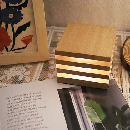 Wooden night light with pastoral design, providing soft, cozy illumination in a bedroom or living room