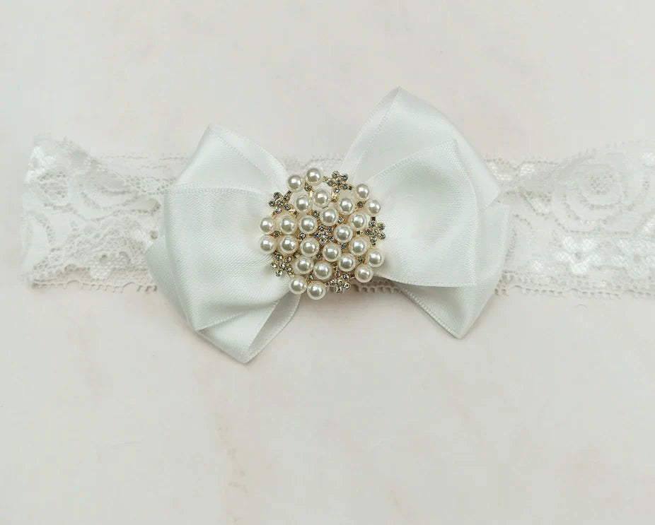 Handmade milky white cloth shoes with lace-up closure and matching fabric headband