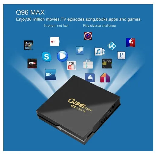 Q96 MAX Android TV set-top box with remote control and HDMI cable on a wooden surface.