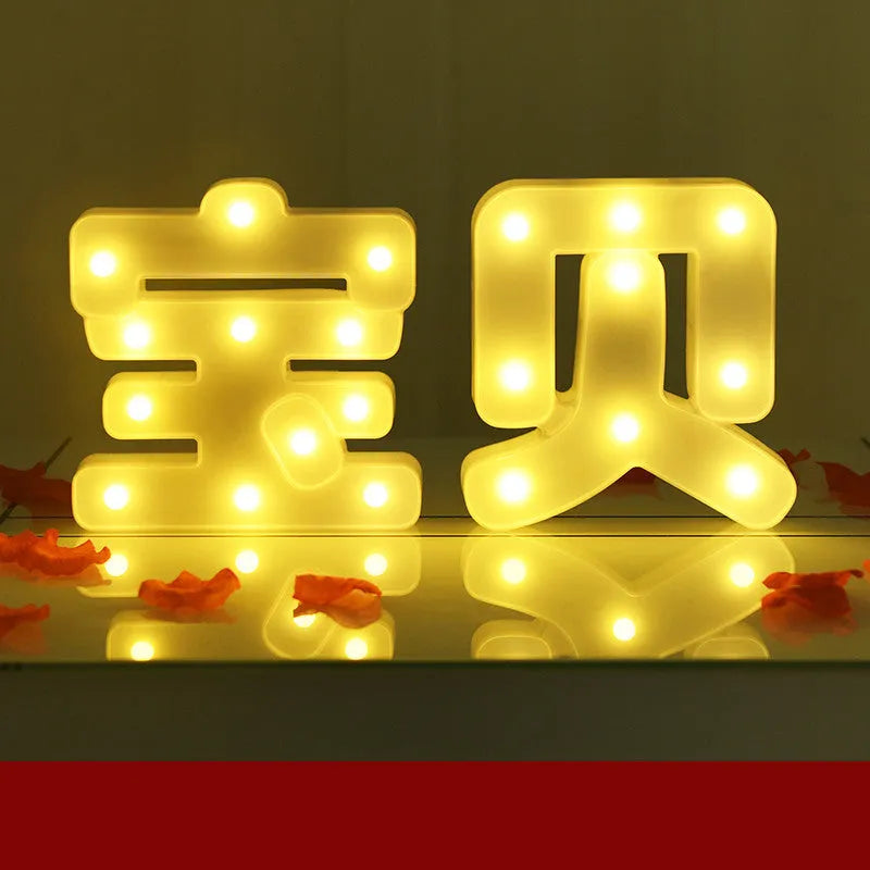 Plastic LED alphabet letter light spelling a message for a birthday or proposal.