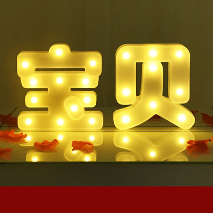 Plastic LED alphabet letter light spelling a message for a birthday or proposal.