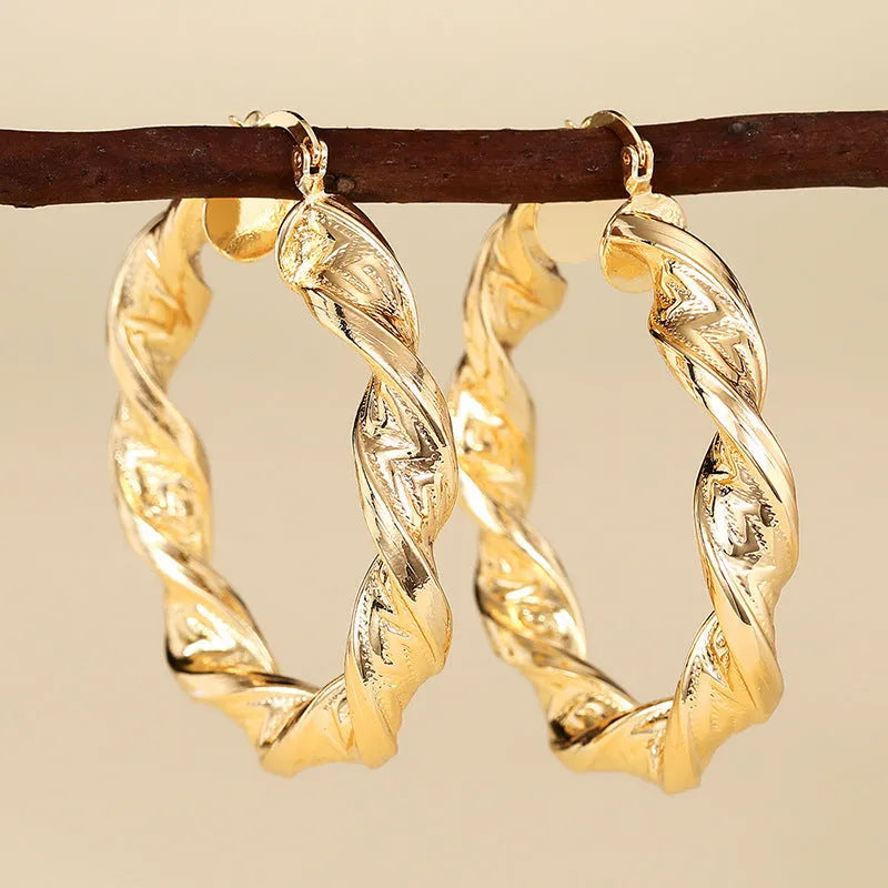 Geometric drop-shaped ear clip earrings with electroplated finish in various colours