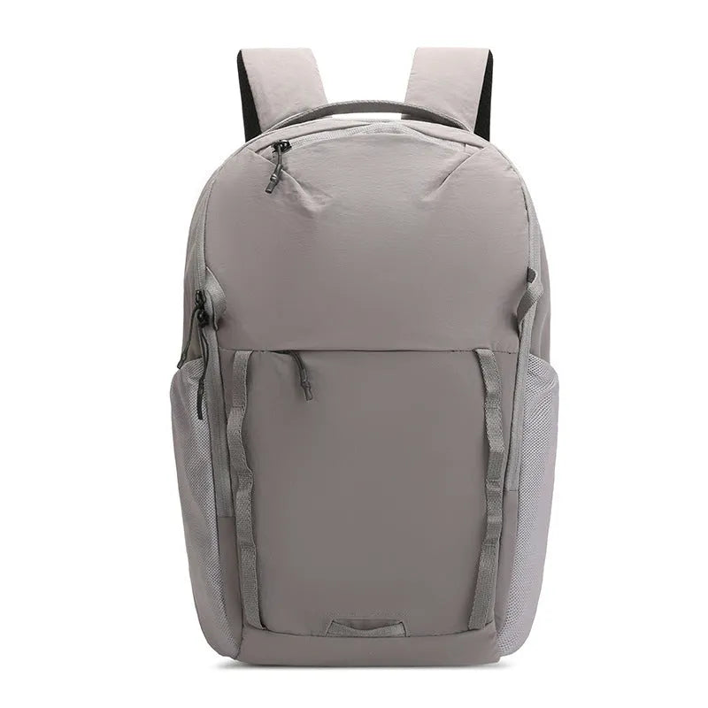 Waterproof Taslan composite cloth backpack in a solid colour with a curved shoulder strap
