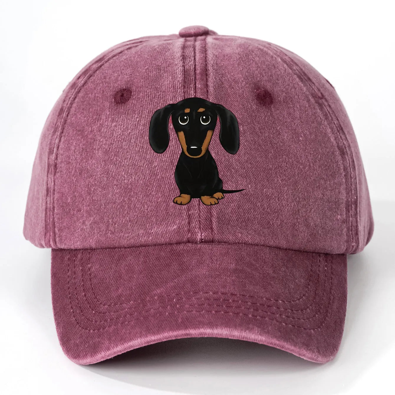 Retro washed cotton baseball cap with Dachshund embroidery, dome crown, and adjustable size tab.