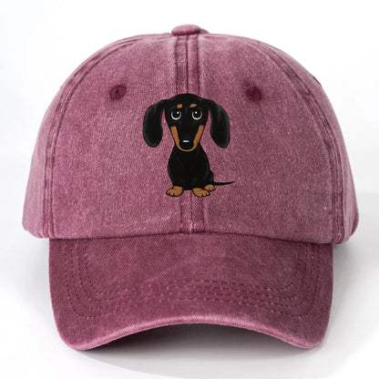 Retro washed cotton baseball cap with Dachshund embroidery, dome crown, and adjustable size tab.