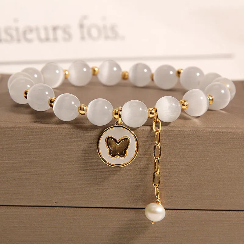 Handmade white cat's eye crystal geometric bracelet for women.