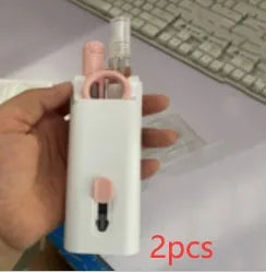 Multifunctional white cleaning pen kit open to show silicone tip, brush, keycap puller, and spray bottle for electronics.