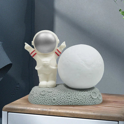 Modern astronaut night lamp with color-changing LED and detachable design