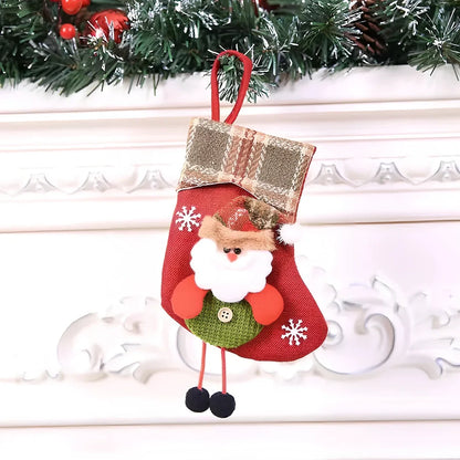 Christmas stocking gift bag measuring 10x20cm with festive character designs