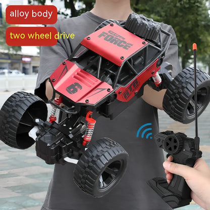 Children's remote control car with six wheels and 38cm climbing capability in black, gold, or red colours