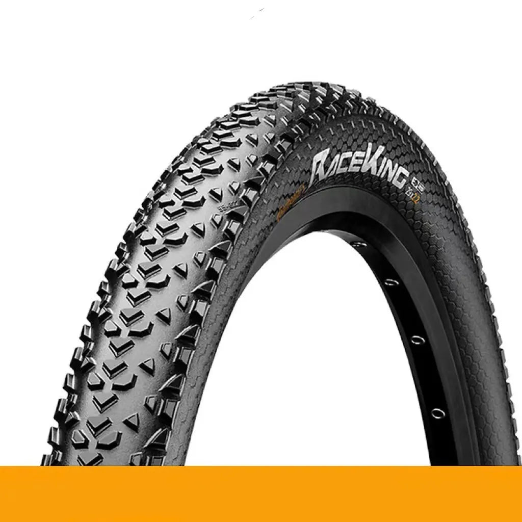 Mountain bike folding outer tyre with yellow sidewall, showing tread pattern and size label