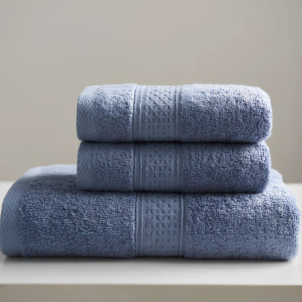 Three cotton towels: 33cm square, 32cm×73cm standard, 70cm×140cm bath towel in coordinated colours