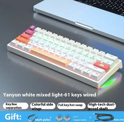 Small white 61-key mechanical keyboard with hot-swappable sockets and a black USB cable.