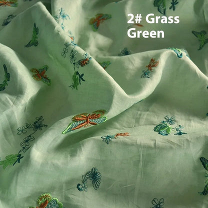 Pure ramie embroidery cloth hanfu fabric in beige, grass green, and dark green colours showing natural texture