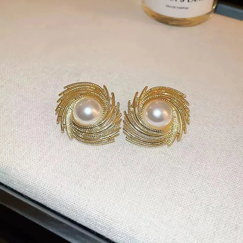 Women's flower-shaped earrings with irregular high-grade pearl accents and electroplated alloy construction