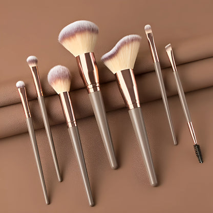 Seven-piece eyeshadow brush set with rayon bristles, PU heads, and 14cm long plastic rod handles in brown or black