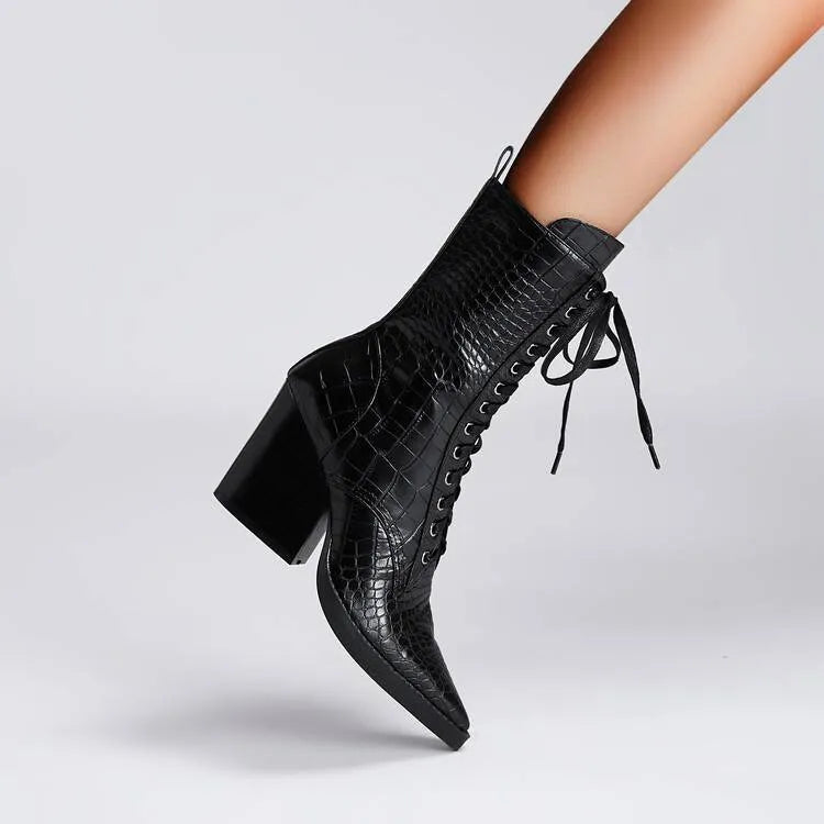 Dark brown women's ankle boots with a chunky heel, pointed toe, side zipper, and a retro stone pattern on the microfiber upper.