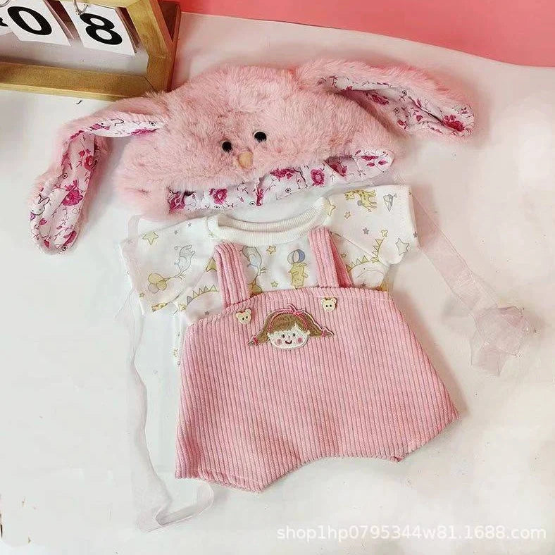 30cm doll clothing collection showing multiple outfit pieces including hooded jackets, sweaters, and suspender pants
