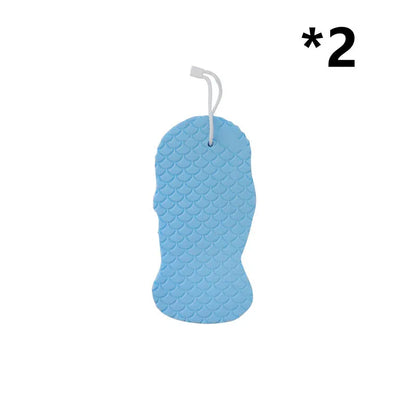 White 3D bath ball sponge with a fish scale exfoliating texture on a blue background.