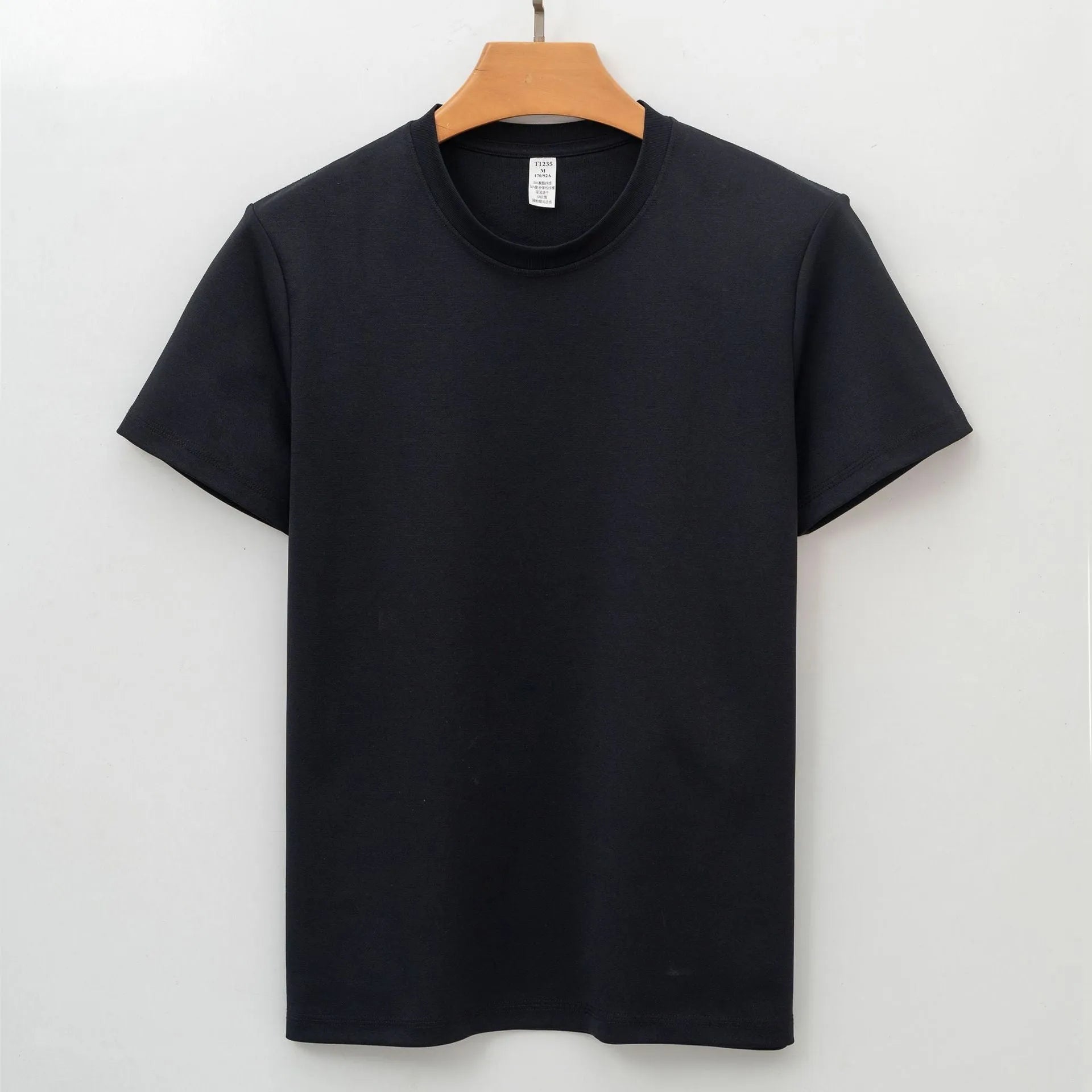 Men's solid colour antibacterial quick-dry short sleeve T-shirt on a hanger.