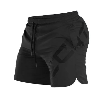 Men's black quick-dry training shorts with elastic waistband, shown knee-length.