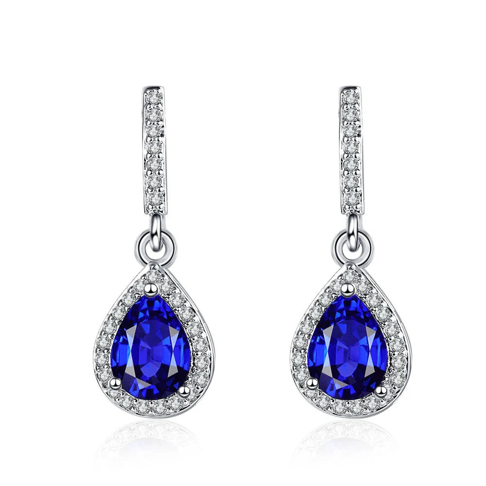 Elegant drop-shaped earrings featuring shimmering zircon stones in a variety of colors, including white, yellow, blue, and red diamond.