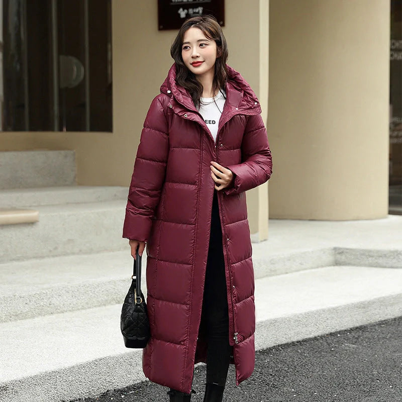 Women's long winter down puffer coat in black, dark red, white, and khaki colors